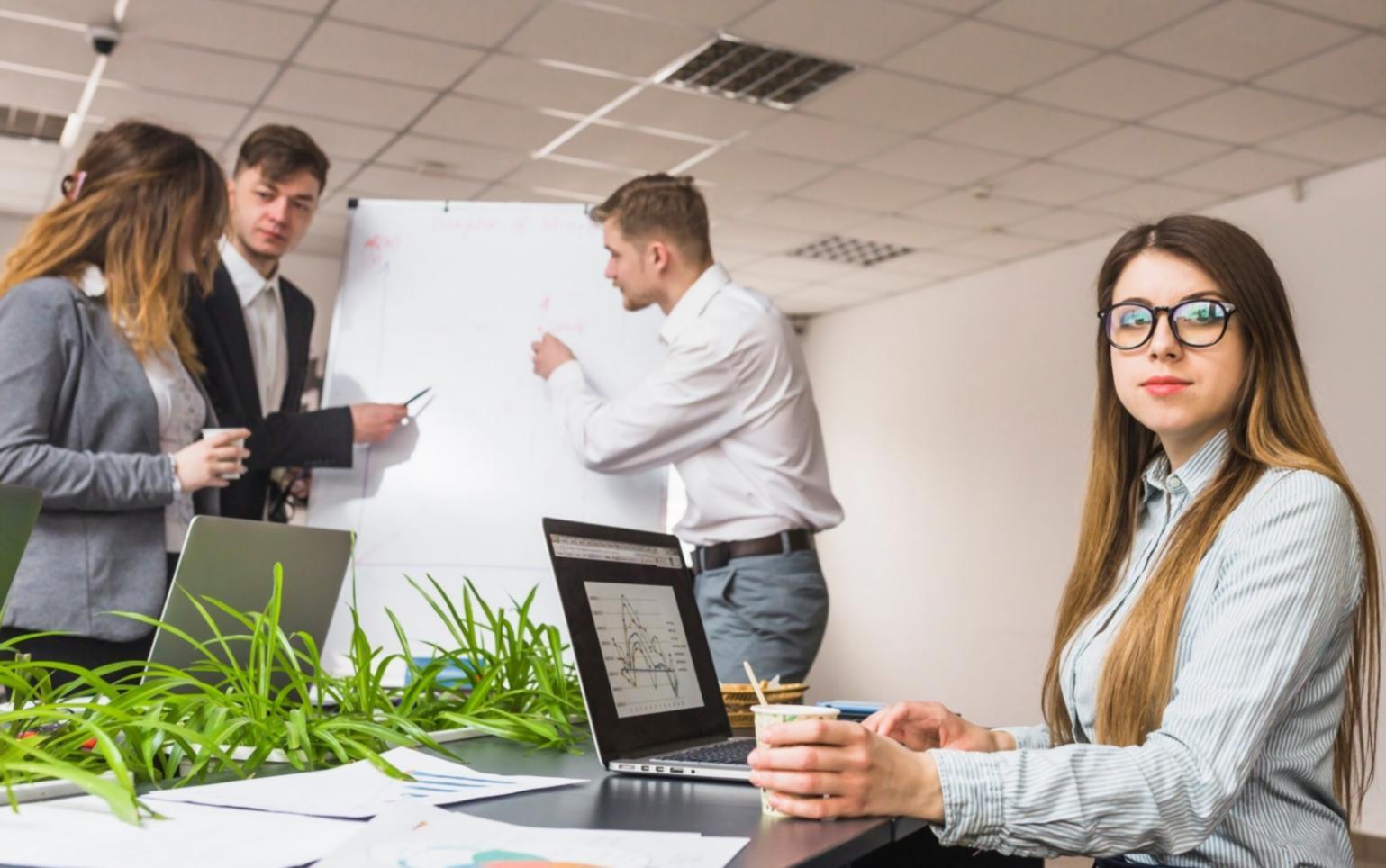 Person using smartphone banking app to track expenses